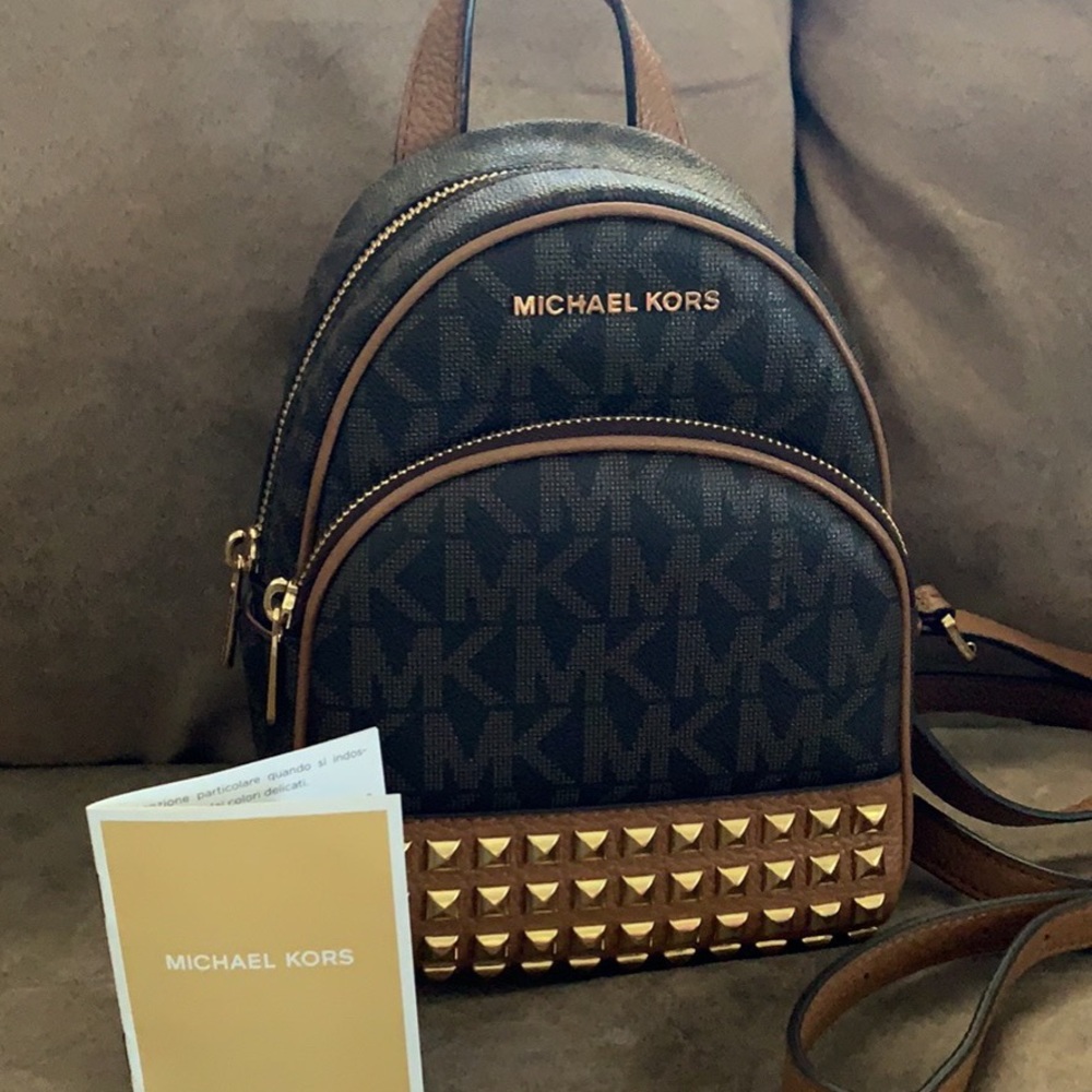 Brand new Michael Kors mini backpack.